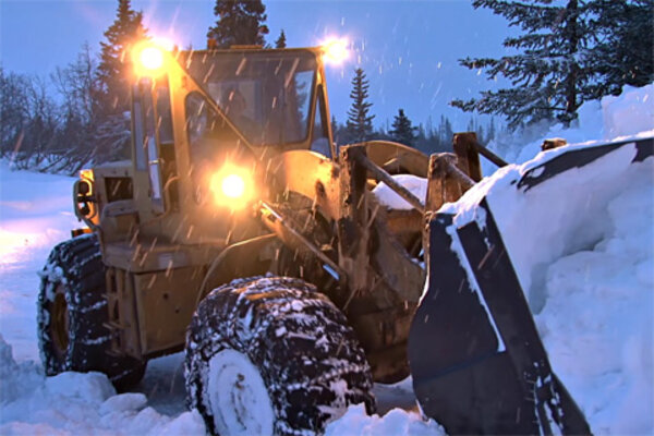 Snowplow digging out from the snow