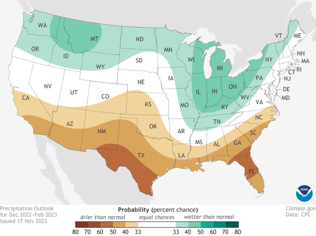 Map of contiguous U.S. with green and brown areas showing probability of wet or dry winter