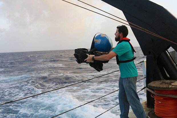 Bouy deployment over the side of a ship