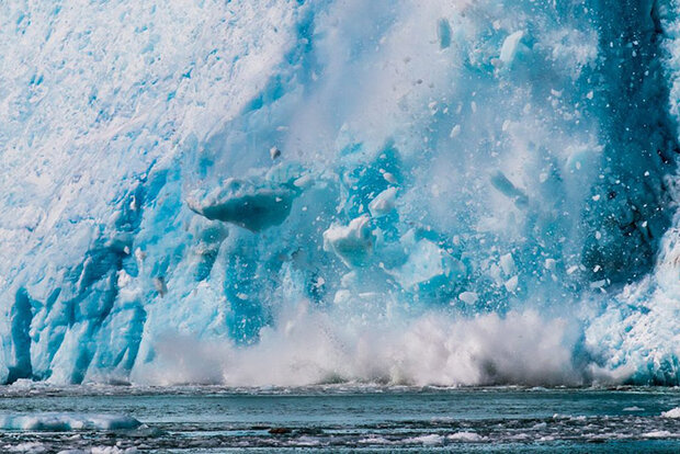 Ice crumbling off glacier front