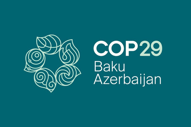 COP29 official logo white text and wreath made of leaves on teal background