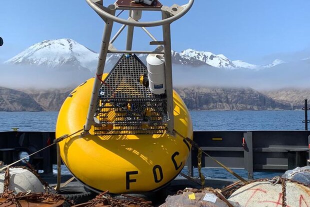 Photo of mooring against mountainous background