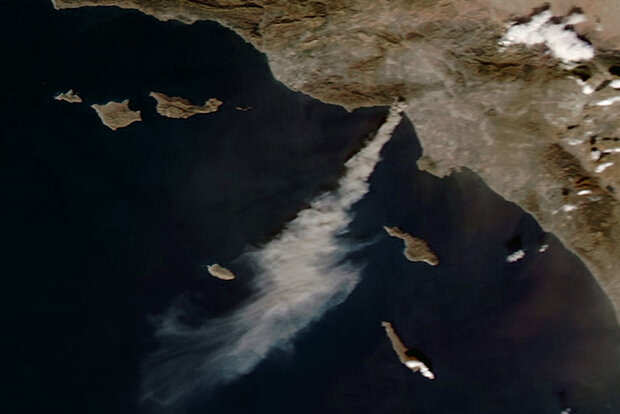 Satellite image of fire smoke over ocean