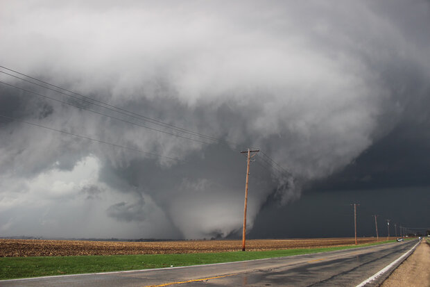 large tornado passing over flat cropland