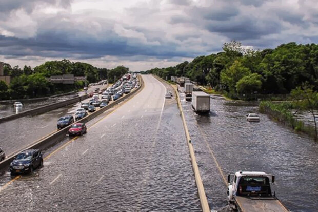 Aerial photo of flooding across four lanes of Sunrise Highway in NY
